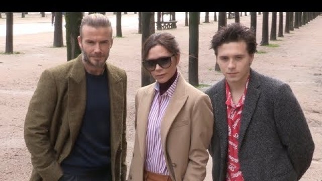 'David, Victoria and Brooklyn Beckham at the Louis Vuitton Menswear Fall Winter 2018 Show'