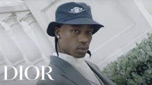 'Travis Scott models the Air Dior line'