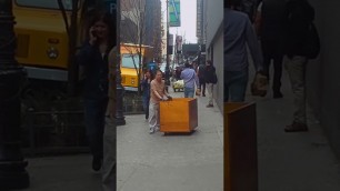 'Hustle and bustle in the New York Fashion District By Closeoutexplosion.com'