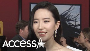 '\'Mulan\' Star Yifei Liu Explains Her Real-Life Disney Princess Fashion'