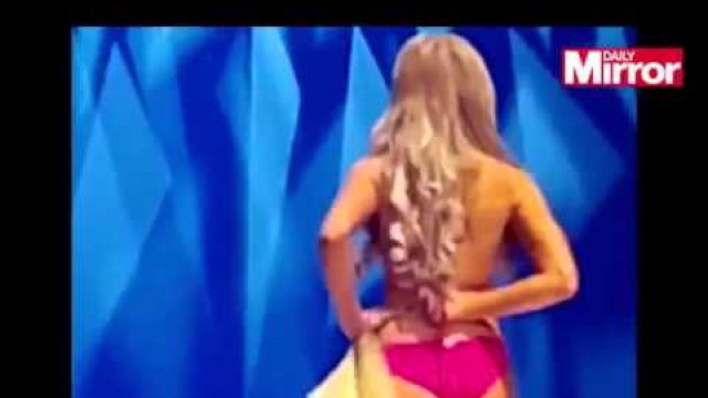 '▶ Miss California contestant exposes BOOBS in catwalk wardrobe malfunction'