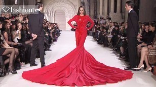 'Yasmin Le Bon in 110-Pound Gown at Stephane Rolland Show - Paris Couture Spring 2012 | FashionTV FTV'