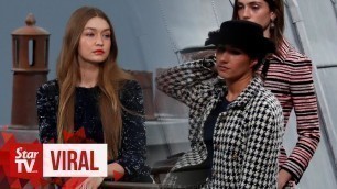 'Gigi Hadid stops Chanel catwalk crasher at Paris Fashion Week'