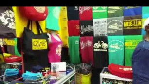 'Lady Making a Killing Selling Medellin T-shirts in Colombia'