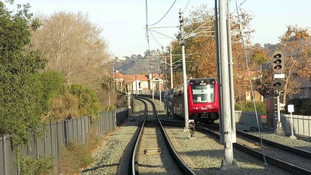 'Trolley departs Mission Valley Center, San Diego Green Line'