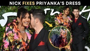 'Nick Jonas ADJUSTS Priyanka Chopra\'s dress in VIRAL video | Fashion Awards RED carpet'